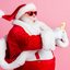 Papai Noel mexendo no celular - Deagreez/iStock