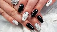 Formas diferentes de inovar a unha com esmalte preto e branco. - Wirestock / istock