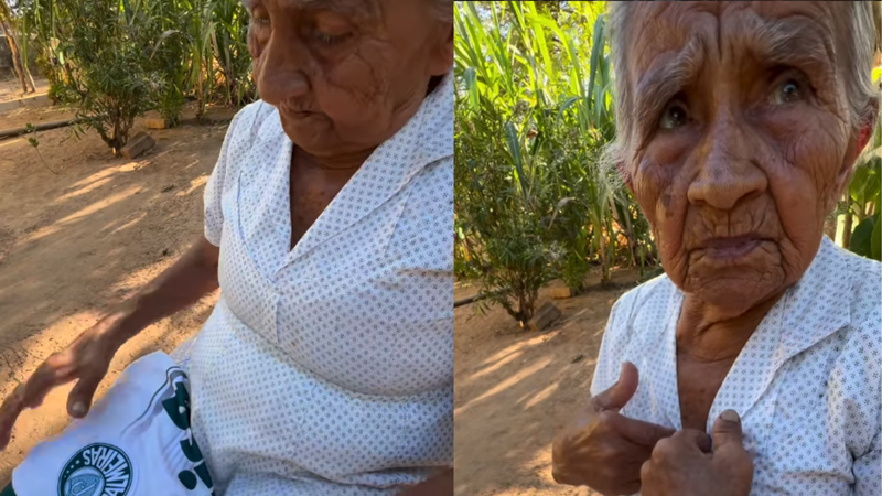 Vovó torcedora com camisa do palmeiras em mãos enquanto é gravada.