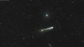 Cometa 3I/ATLAS cruzando o espaço.
