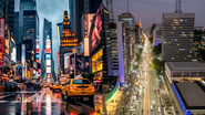 imagens da Times Square e da Avenida Paulista lado a lado.