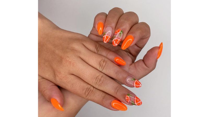 Desenhos de laranja também são uma laternativa divertidíssima para esta cor de esmalte.