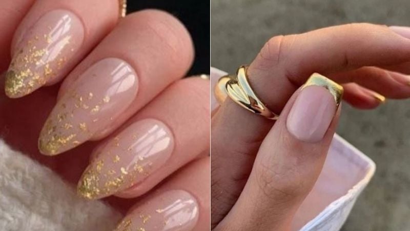 Unhas decoradas com esmalte dourado.