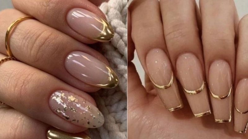 Unhas decoradas com esmalte dourado.