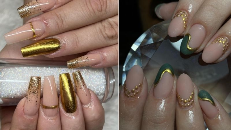 Unhas decoradas com esmalte dourado.