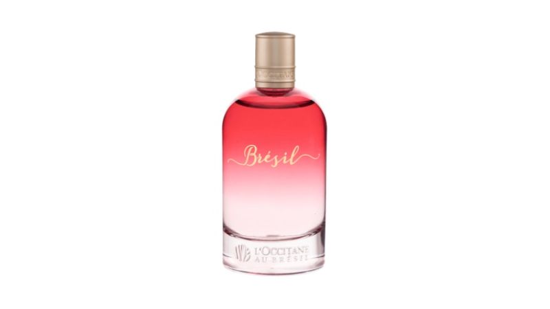 perfume com frasco avermelhado.
