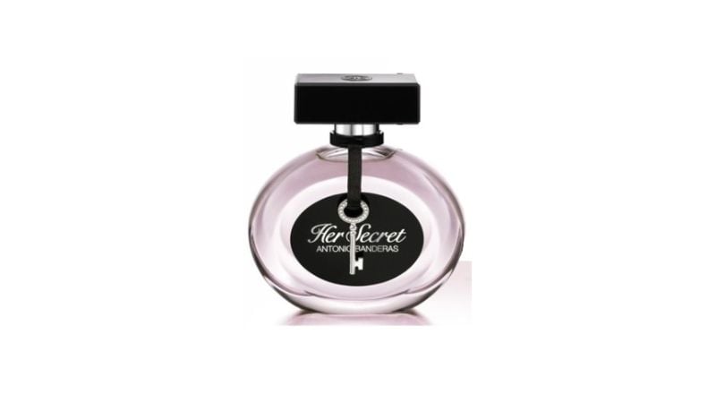 Perfume com frasco rosa e tampa preta