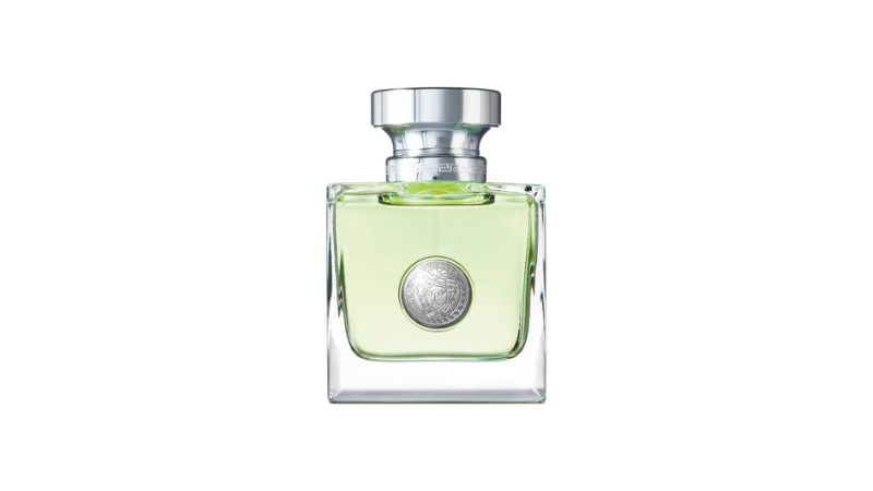 frasco de perfume esverdeado